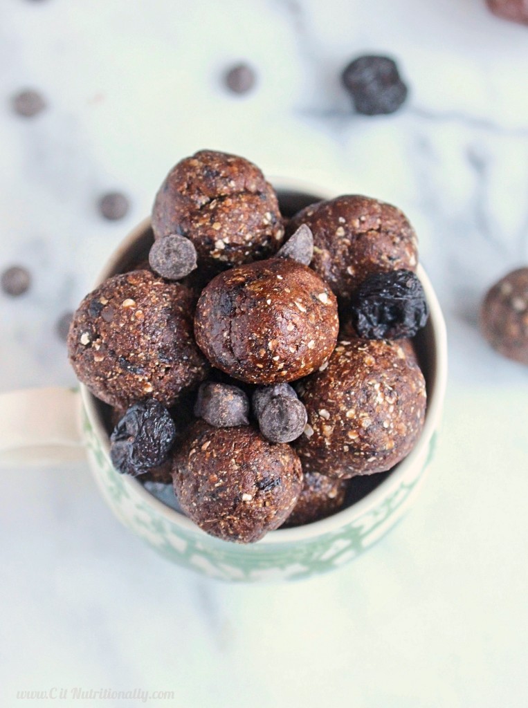 Take a bite into these chewy chocolatey Chocolate Cherry Energy Bites made without added sugar but for a sweet treat with almost 2.5 grams of fiber in each bite...the perfect pre-workout snack! Nut free, sunflower seed free, Peanut free, food allergy friendly! Chocolate Cherry Energy Bites | C it Nutritionally