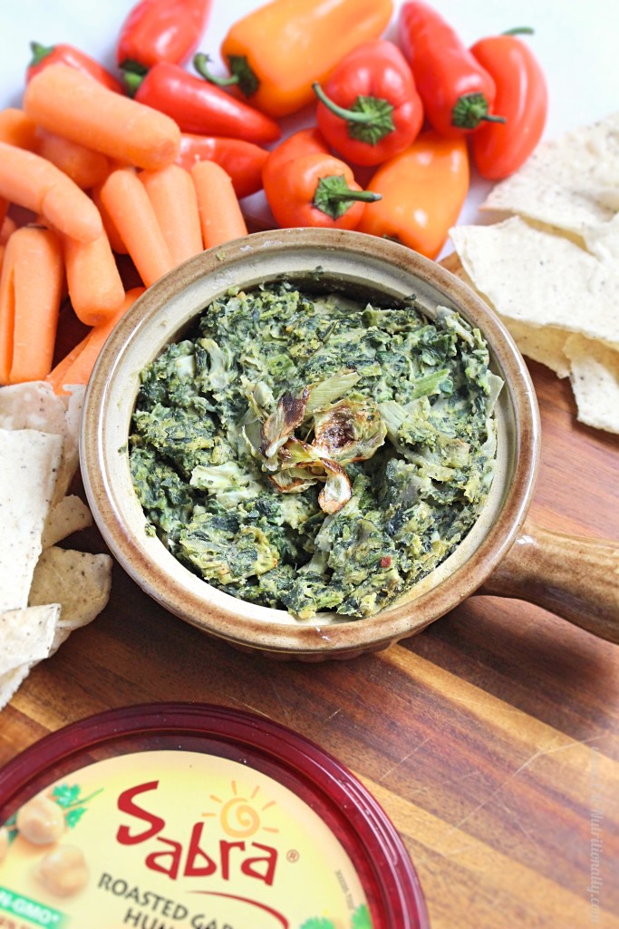Vegan Spinach and Artichoke Hummus Dip | C it Nutritionally Creamy and savory, with a hint of heat, this flavorful Warm Vegan Spinach and Artichoke Hummus Dip will wow a crowd in under 20 minutes (plus, it’s full of protein and fiber… but you don’t have to tell anyone that part!). Nut free, Gluten free, Vegan, Grain free. #ad