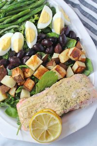 Salmon Nicoise Salad | Chelsey Amer Nutrition by Chelsey Amer, MS, RDN, CDN This Salmon Nicoise Salad is a delicious combination of baked salmon, roasted potatoes and green beans, salty olives, and hard boiled eggs, over leafy greens, for a balanced plate in this one recipe! Gluten Free, Dairy Free, Low FODMAP, Nut Free, Soy Free
