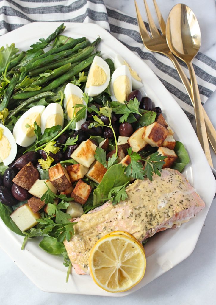 Salmon Nicoise Salad | Chelsey Amer Nutrition by Chelsey Amer, MS, RDN, CDN This Salmon Nicoise Salad is a delicious combination of baked salmon, roasted potatoes and green beans, salty olives, and hard boiled eggs, over leafy greens, for a balanced plate in this one recipe! Gluten Free, Dairy Free, Low FODMAP, Nut Free, Soy Free