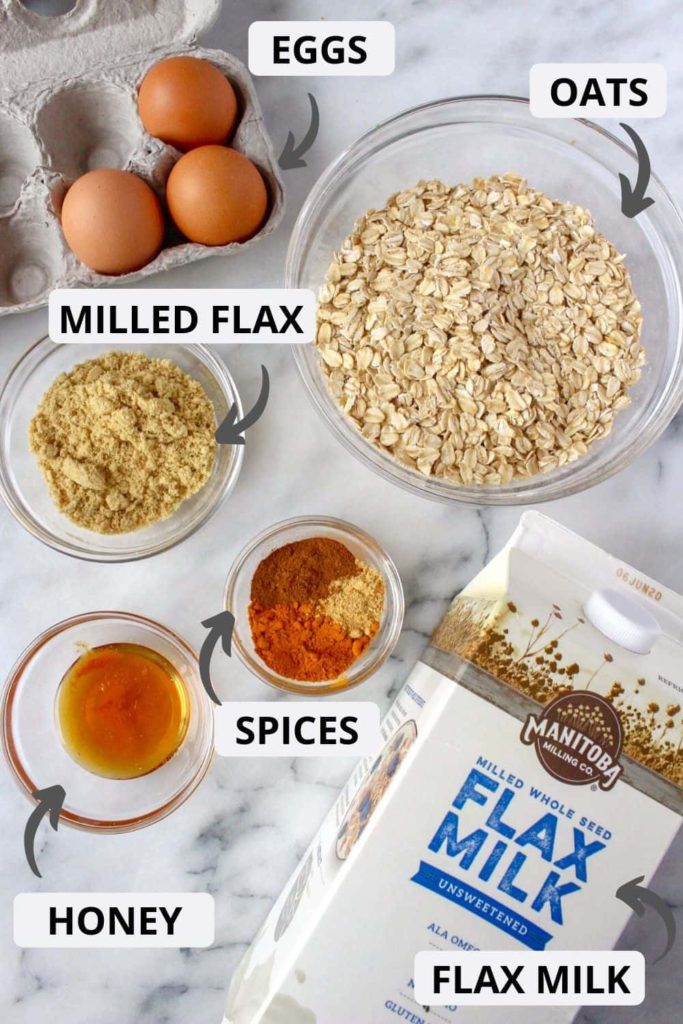 Ingredients to make baked oatmeal - turmeric, flax milk, milled flaxseed, oats, honey, eggs