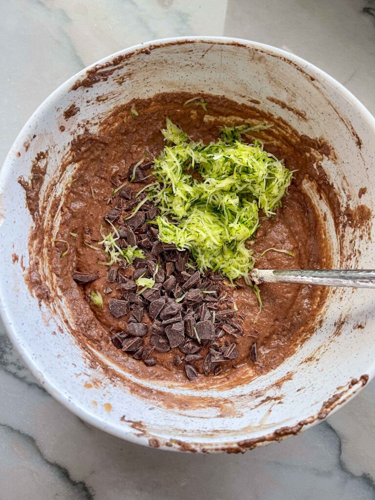 Mixing bowl of Ingredients to Make Egg-Free Chocolate Zucchini Muffins