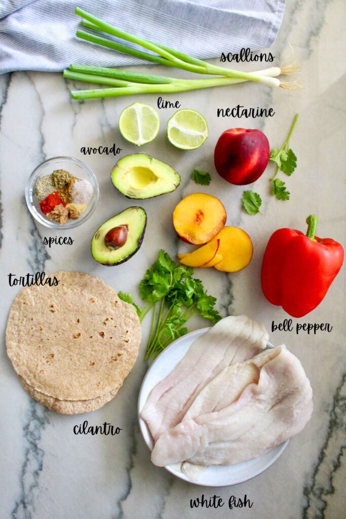 Ingredients to make baked fish tacos with nectarine salsa